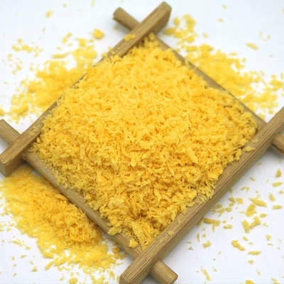 Le Japonais jaune croquant croustillant floconneux Panko s'écaille odeur cuite au four de pain